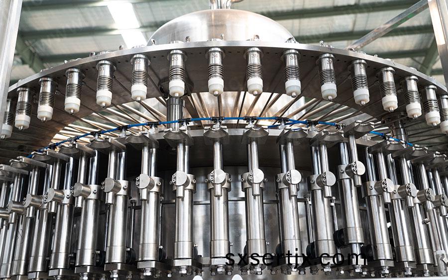 全自(zi)動(dong)菓(guo)汁(zhi)灌裝(zhuang)機灌裝部(bu)分(fen) 全(quan)自(zi)動菓(guo)汁(zhi)灌裝機(ji)灌(guan)裝部分(fen)