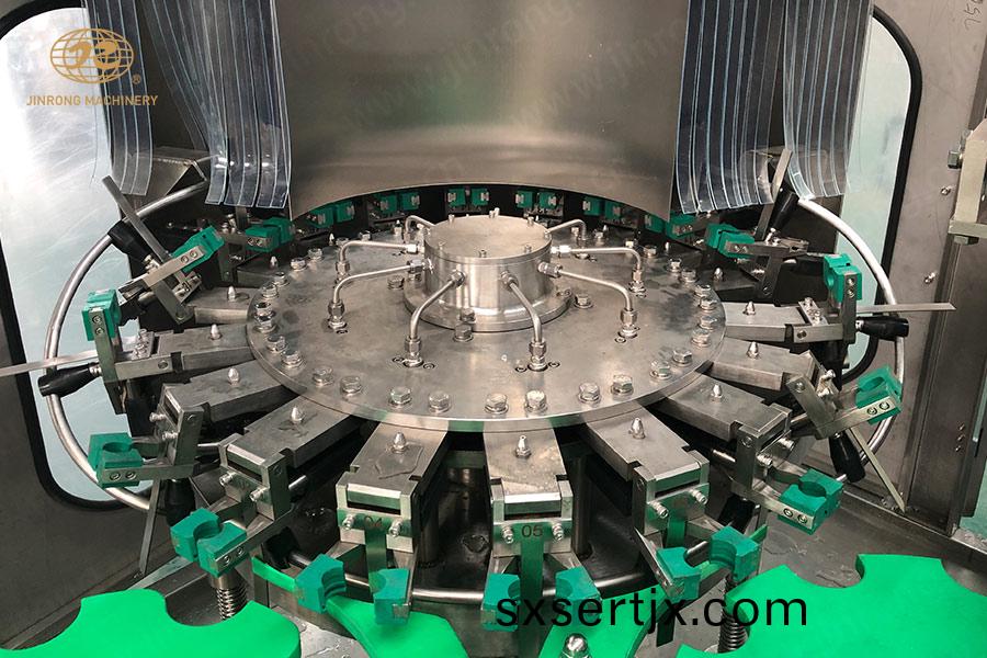 玻(bo)瓈缾含(han)汽(qi)飲料設備洗(xi)缾部(bu)分(fen)